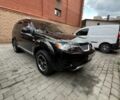 Черный Мицубиси Аутлендер, объемом двигателя 2.4 л и пробегом 156 тыс. км за 8500 $, фото 5 на Automoto.ua