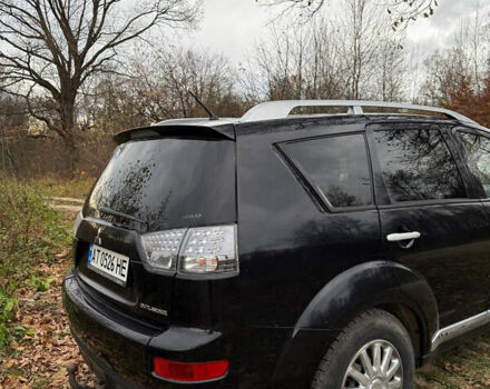 Черный Мицубиси Аутлендер, объемом двигателя 2.18 л и пробегом 233 тыс. км за 9600 $, фото 2 на Automoto.ua