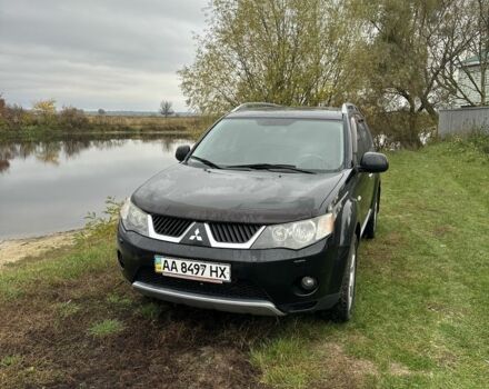 Чорний Міцубісі Аутлендер, об'ємом двигуна 2.4 л та пробігом 186 тис. км за 8700 $, фото 1 на Automoto.ua