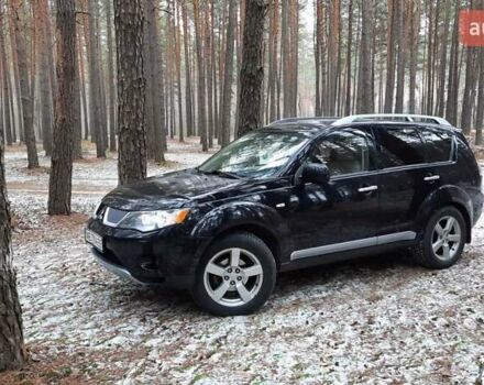 Черный Мицубиси Аутлендер, объемом двигателя 2.4 л и пробегом 228 тыс. км за 10400 $, фото 3 на Automoto.ua