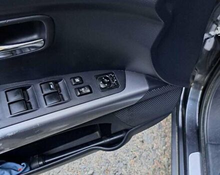 Черный Мицубиси Аутлендер, объемом двигателя 2.36 л и пробегом 245 тыс. км за 9200 $, фото 5 на Automoto.ua