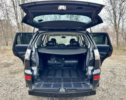 Чорний Міцубісі Аутлендер, об'ємом двигуна 2.4 л та пробігом 229 тис. км за 9790 $, фото 21 на Automoto.ua