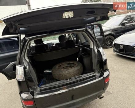 Черный Мицубиси Аутлендер, объемом двигателя 2.4 л и пробегом 185 тыс. км за 7900 $, фото 15 на Automoto.ua