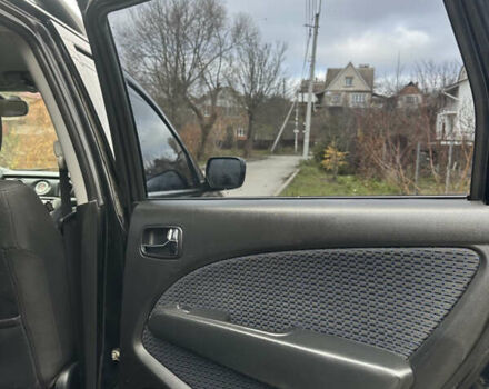 Чорний Міцубісі Аутлендер, об'ємом двигуна 2 л та пробігом 118 тис. км за 8100 $, фото 22 на Automoto.ua