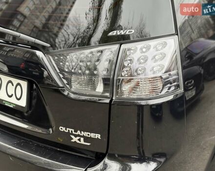 Черный Мицубиси Аутлендер, объемом двигателя 2.4 л и пробегом 185 тыс. км за 7900 $, фото 13 на Automoto.ua