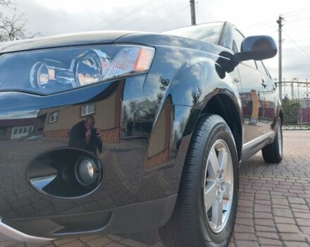 Черный Мицубиси Аутлендер, объемом двигателя 2 л и пробегом 249 тыс. км за 8750 $, фото 18 на Automoto.ua