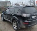 Черный Мицубиси Аутлендер, объемом двигателя 3 л и пробегом 152 тыс. км за 8700 $, фото 3 на Automoto.ua