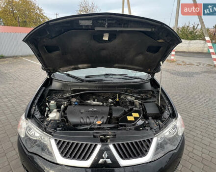 Міцубісі Аутлендер 2008 у Кременчуге на Automoto.ua Чорний Міцубісі Аутлендер, об'ємом двигуна 2.4 л та пробігом 230 тис. км за 6650 $, фото 62 на Automoto.ua