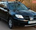 Черный Мицубиси Аутлендер, объемом двигателя 2 л и пробегом 190 тыс. км за 6900 $, фото 9 на Automoto.ua