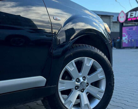 Черный Мицубиси Аутлендер, объемом двигателя 1.97 л и пробегом 202 тыс. км за 9700 $, фото 8 на Automoto.ua