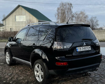 Чорний Міцубісі Аутлендер, об'ємом двигуна 2.36 л та пробігом 293 тис. км за 7900 $, фото 2 на Automoto.ua