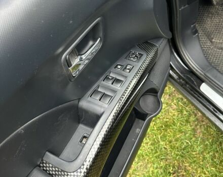 Чорний Міцубісі Аутлендер, об'ємом двигуна 2.4 л та пробігом 186 тис. км за 8700 $, фото 10 на Automoto.ua