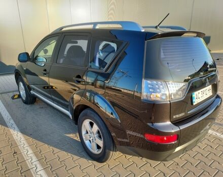 Чорний Міцубісі Аутлендер, об'ємом двигуна 2 л та пробігом 300 тис. км за 7500 $, фото 2 на Automoto.ua