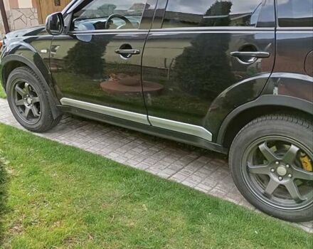 Черный Мицубиси Аутлендер, объемом двигателя 2.35 л и пробегом 245 тыс. км за 8000 $, фото 18 на Automoto.ua