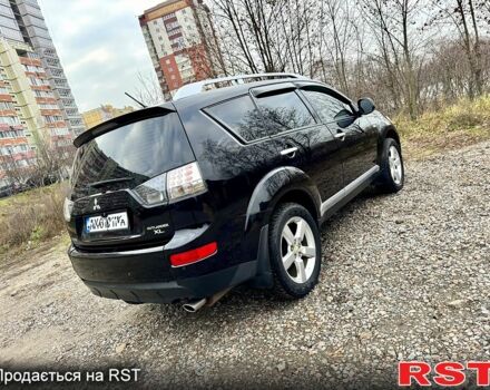 Черный Мицубиси Аутлендер, объемом двигателя 2.4 л и пробегом 229 тыс. км за 9790 $, фото 6 на Automoto.ua