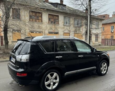 Черный Мицубиси Аутлендер, объемом двигателя 2 л и пробегом 377 тыс. км за 5200 $, фото 5 на Automoto.ua