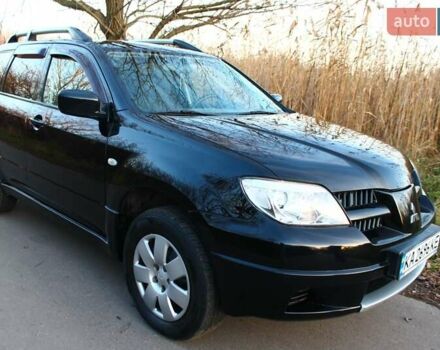 Черный Мицубиси Аутлендер, объемом двигателя 2 л и пробегом 189 тыс. км за 7200 $, фото 32 на Automoto.ua