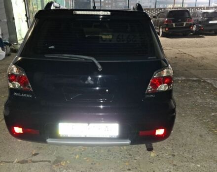 Чорний Міцубісі Аутлендер, об'ємом двигуна 2 л та пробігом 117 тис. км за 7900 $, фото 5 на Automoto.ua