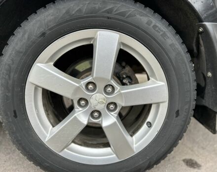 Чорний Міцубісі Аутлендер, об'ємом двигуна 2 л та пробігом 238 тис. км за 5500 $, фото 10 на Automoto.ua