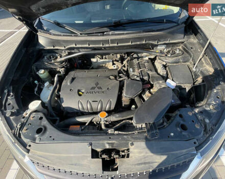 Чорний Міцубісі Аутлендер, об'ємом двигуна 2.4 л та пробігом 195 тис. км за 8600 $, фото 20 на Automoto.ua