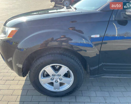 Чорний Міцубісі Аутлендер, об'ємом двигуна 2.4 л та пробігом 195 тис. км за 8600 $, фото 5 на Automoto.ua