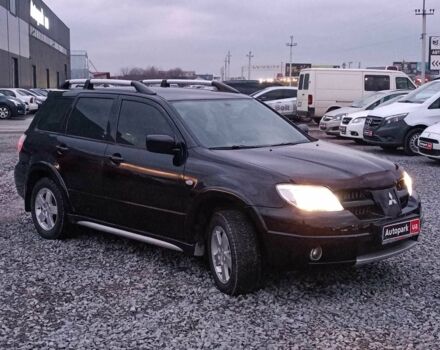 Черный Мицубиси Аутлендер, объемом двигателя 2 л и пробегом 271 тыс. км за 6940 $, фото 11 на Automoto.ua