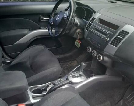 Чорний Міцубісі Аутлендер, об'ємом двигуна 2.36 л та пробігом 252 тис. км за 8900 $, фото 2 на Automoto.ua