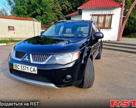 Черный Мицубиси Аутлендер, объемом двигателя 2.4 л и пробегом 189 тыс. км за 7000 $, фото 5 на Automoto.ua