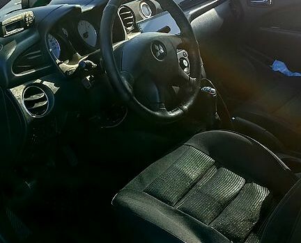 Чорний Міцубісі Аутлендер, об'ємом двигуна 2 л та пробігом 364 тис. км за 5900 $, фото 4 на Automoto.ua