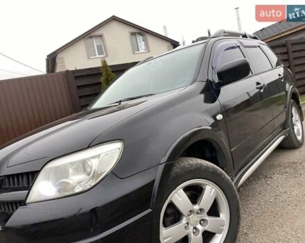 Черный Мицубиси Аутлендер, объемом двигателя 2.4 л и пробегом 178 тыс. км за 6900 $, фото 13 на Automoto.ua