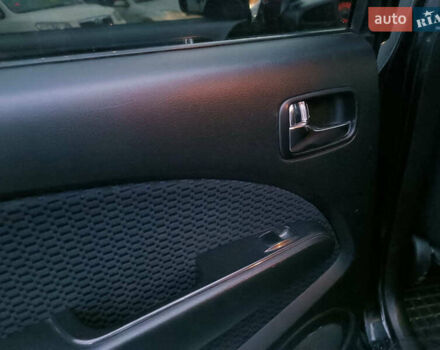 Чорний Міцубісі Аутлендер, об'ємом двигуна 2 л та пробігом 271 тис. км за 6940 $, фото 18 на Automoto.ua