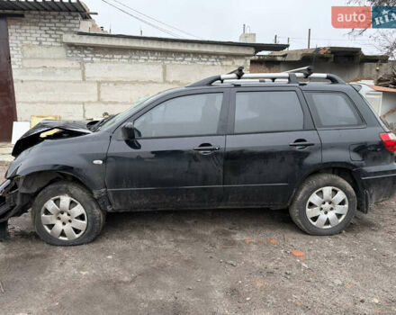 Черный Мицубиси Аутлендер, объемом двигателя 2 л и пробегом 200 тыс. км за 2999 $, фото 9 на Automoto.ua