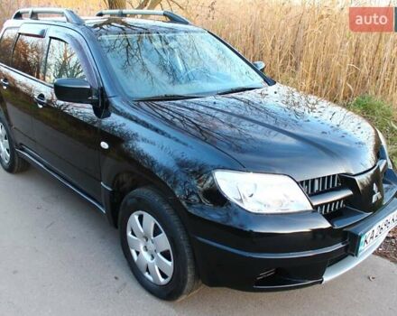 Черный Мицубиси Аутлендер, объемом двигателя 2 л и пробегом 190 тыс. км за 6900 $, фото 16 на Automoto.ua