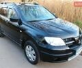 Черный Мицубиси Аутлендер, объемом двигателя 2 л и пробегом 190 тыс. км за 6900 $, фото 16 на Automoto.ua