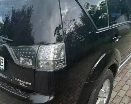 Чорний Міцубісі Аутлендер, об'ємом двигуна 2.36 л та пробігом 252 тис. км за 8900 $, фото 3 на Automoto.ua