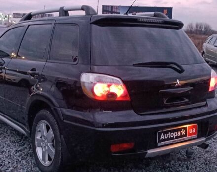 Черный Мицубиси Аутлендер, объемом двигателя 2 л и пробегом 271 тыс. км за 6940 $, фото 6 на Automoto.ua