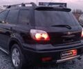 Черный Мицубиси Аутлендер, объемом двигателя 2 л и пробегом 271 тыс. км за 6940 $, фото 6 на Automoto.ua
