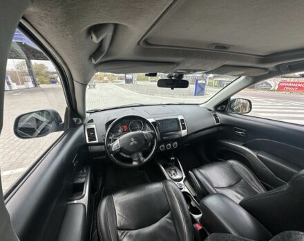 Чорний Міцубісі Аутлендер, об'ємом двигуна 2.4 л та пробігом 218 тис. км за 10000 $, фото 5 на Automoto.ua