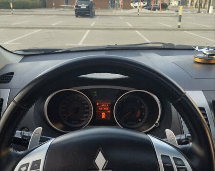 Черный Мицубиси Аутлендер, объемом двигателя 2.4 л и пробегом 237 тыс. км за 5000 $, фото 9 на Automoto.ua