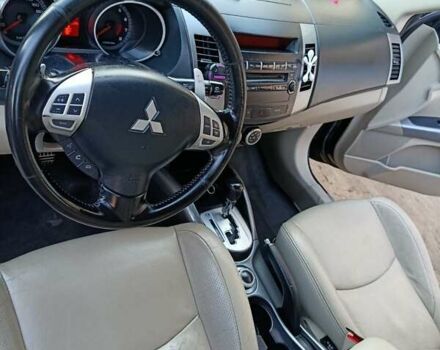 Черный Мицубиси Аутлендер, объемом двигателя 2.36 л и пробегом 203 тыс. км за 9200 $, фото 12 на Automoto.ua