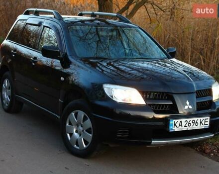 Черный Мицубиси Аутлендер, объемом двигателя 2 л и пробегом 189 тыс. км за 7200 $, фото 9 на Automoto.ua