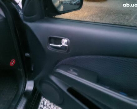 Черный Мицубиси Аутлендер, объемом двигателя 2 л и пробегом 271 тыс. км за 6940 $, фото 21 на Automoto.ua