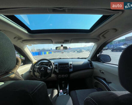 Чорний Міцубісі Аутлендер, об'ємом двигуна 2.4 л та пробігом 195 тис. км за 8600 $, фото 17 на Automoto.ua