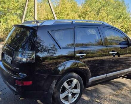 Черный Мицубиси Аутлендер, объемом двигателя 2.4 л и пробегом 178 тыс. км за 9150 $, фото 3 на Automoto.ua