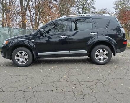 Чорний Міцубісі Аутлендер, об'ємом двигуна 2.36 л та пробігом 265 тис. км за 8800 $, фото 19 на Automoto.ua