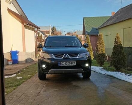 Черный Мицубиси Аутлендер, объемом двигателя 2.35 л и пробегом 245 тыс. км за 8000 $, фото 2 на Automoto.ua