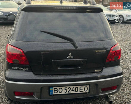 Черный Мицубиси Аутлендер, объемом двигателя 2 л и пробегом 240 тыс. км за 5500 $, фото 5 на Automoto.ua