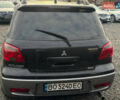 Черный Мицубиси Аутлендер, объемом двигателя 2 л и пробегом 240 тыс. км за 5500 $, фото 5 на Automoto.ua