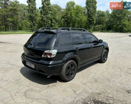 Мицубиси Аутлендер 2008 в Днепре (Днепропетровске) на Automoto.ua Черный Мицубиси Аутлендер, объемом двигателя 2.38 л и пробегом 320 тыс. км за 7500 $, фото 5 на Automoto.ua