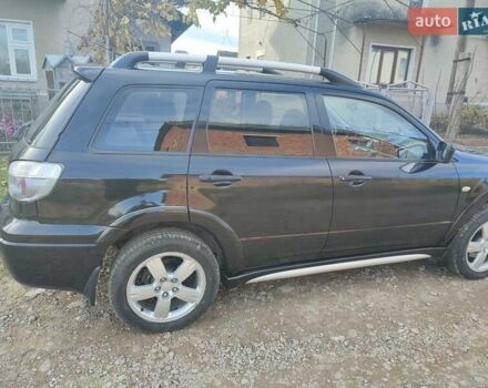 Міцубісі Аутлендер 2008 у Івано-Франківську на Automoto.ua Чорний Міцубісі Аутлендер, об'ємом двигуна 2 л та пробігом 128 тис. км за 7000 $, фото 17 на Automoto.ua